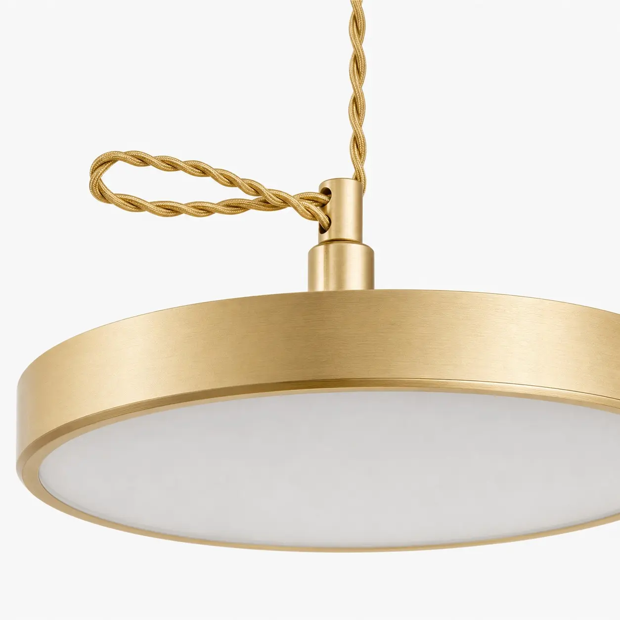 Gold lamp body and suspension cord detail