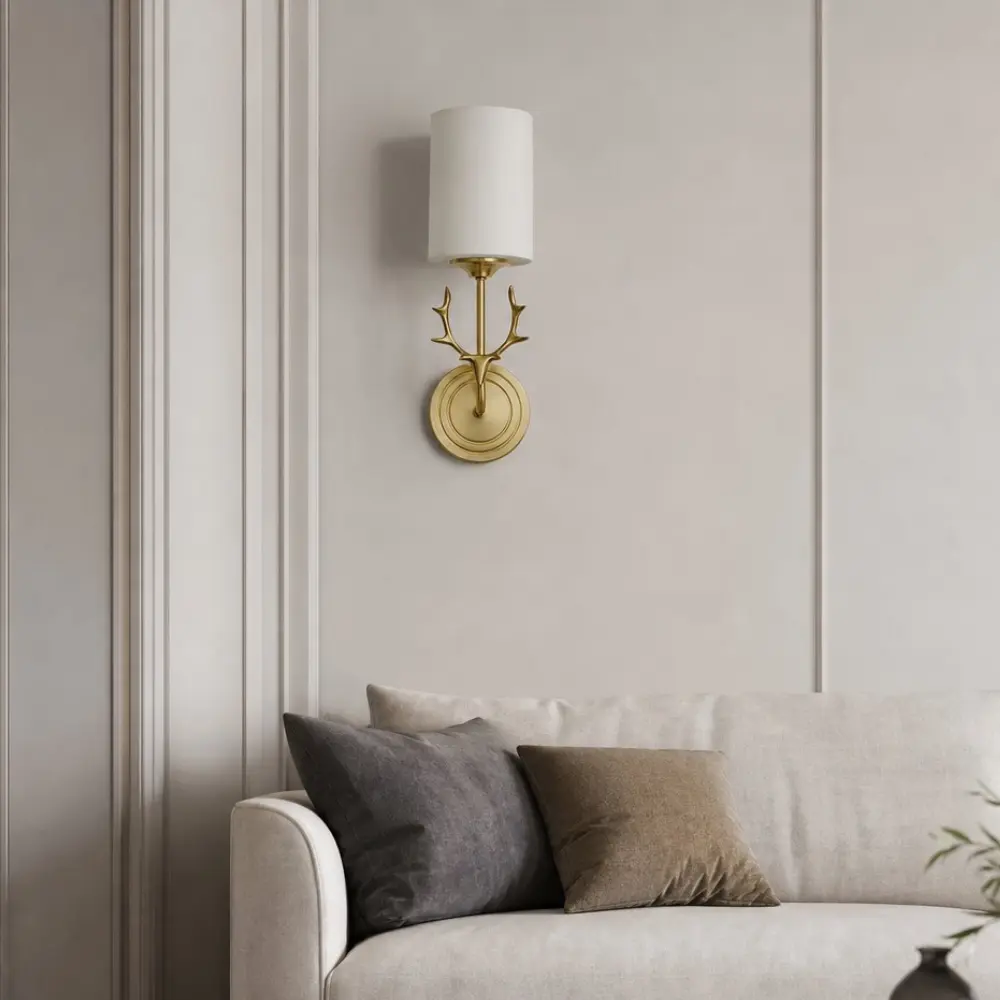 Copper and glass antler sconce in an interior setting