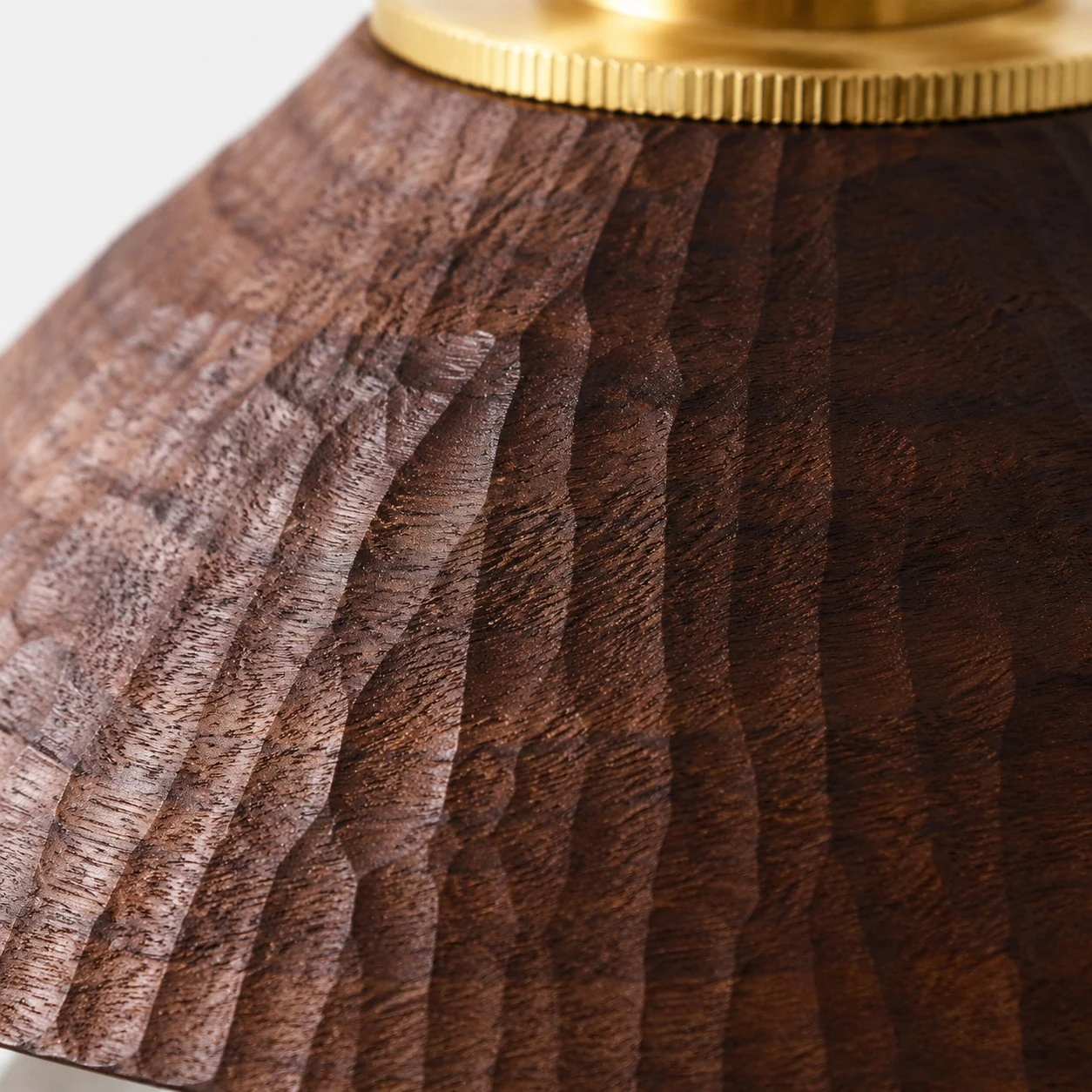 Close view of hand-carved black walnut grain and ridges