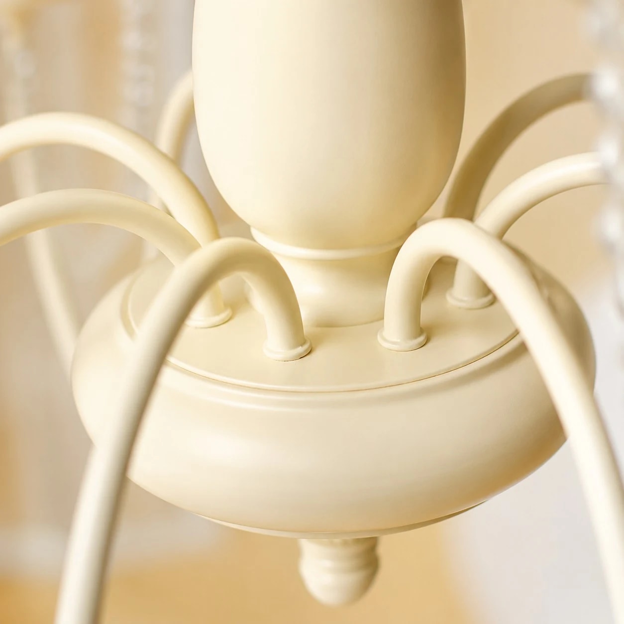 Vintage crystal chandelier metal body and curved arm detail