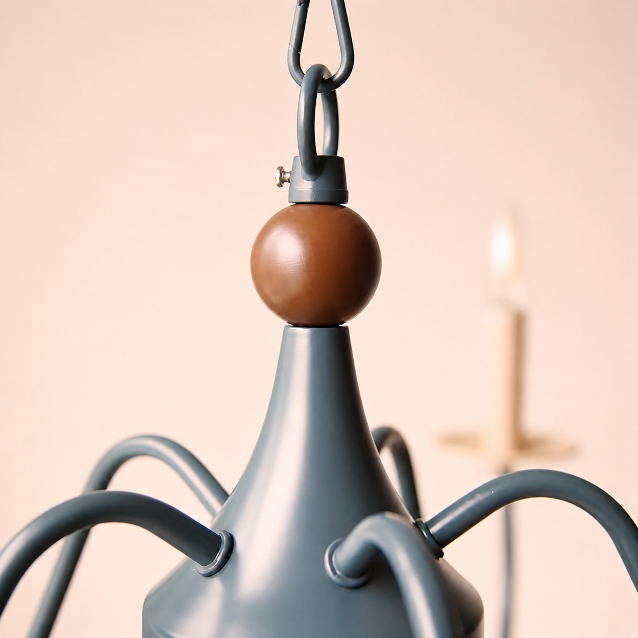 French candle chandelier top accent and curved arms detail